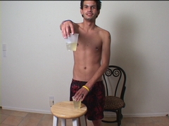 twink with two cups of his own piss fetish peeing